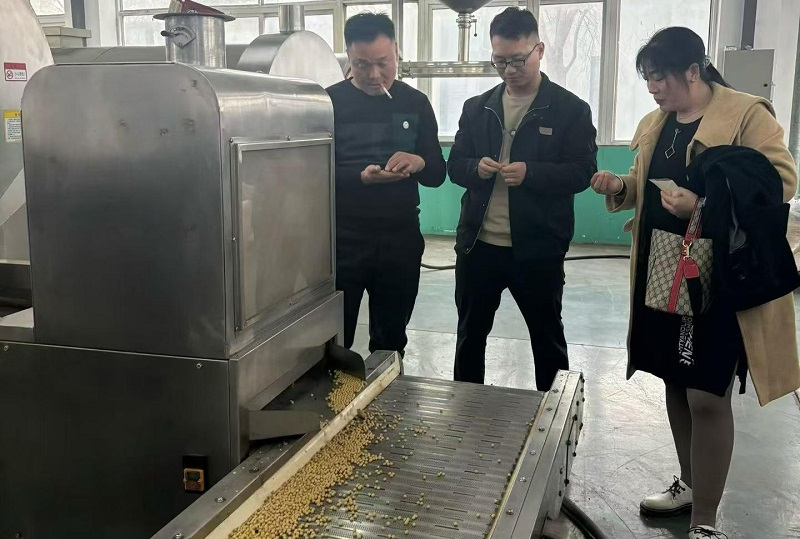 Customer inspection of soybean roasting equipment